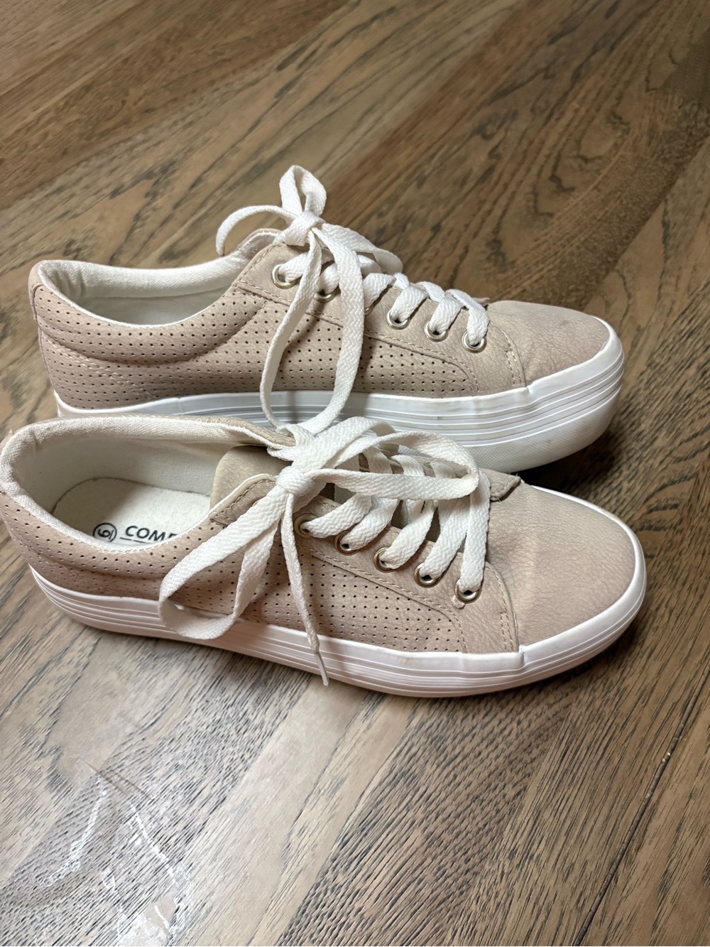 Comfort In Every Stepby Women's Playform Sneakers in tan.
